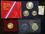 1971 S Silver Brilliant Uncirculated Eisenhower Dollar in blue envelope; 1982 S Proof George Washing