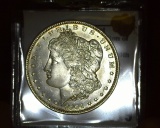 1904 O Morgan Silver Dollar, Brilliant Uncirculated with toned reverse.