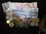 Seven Dollars face in Canada Cuirrency; over $7.50 face in old Canada Coins; and over $3.50 face in