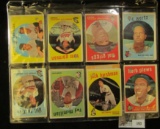 (18) 1957-64 era Topps Baseball Cards (most hole cancelled) in a plastic page. Includes a 1964 Carl