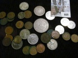 A nice early Group of foreign coins, most of which are Canadian. Several Silver coins including a 19