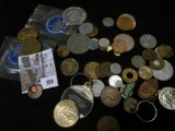 Large group of foreign coins and U.S. Tokens including a punchout Masonic Penny.
