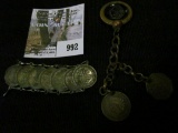 Couple pieces of Coin Jewelry, one of which is made of Russia Silver 10 Kopek Coins and the other ha