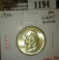 1952 Washington Quarter, BU light toning, MS63 value $10, MS65 value $25