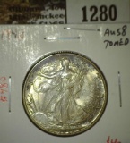 1942 Walking Liberty Half, AU58 toned, value $40