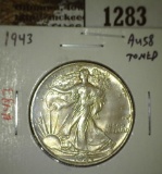 1943 Walking Liberty Half, AU58 toned, value $35