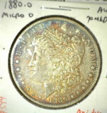 1880-O Morgan Dollar, micro O, AU toned, value $43