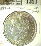1882-O Morgan Dollar, VF toned, value $35