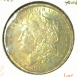 1883-O Morgan Dollar, BU toned, value $75