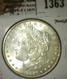1887 Morgan Dollar, BU toned, value $75