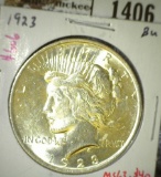 1923 Peace Dollar, BU, MS63 value $40, MS64 value $55