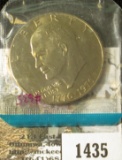 1976 Eisenhower Dollar, type 2 (1976), still in Mint Cello, BU, value $10+