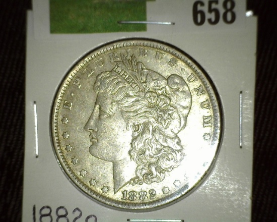 1882 O Morgan Silver Dollar.