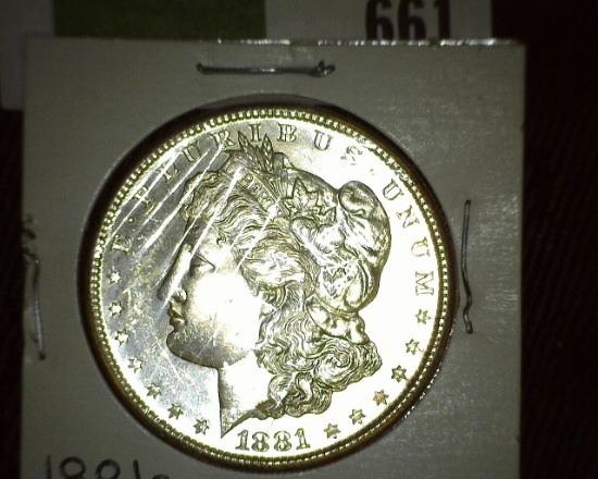 1881 S Morgan Silver Dollar. Brilliant Uncirculated with light natural toning.