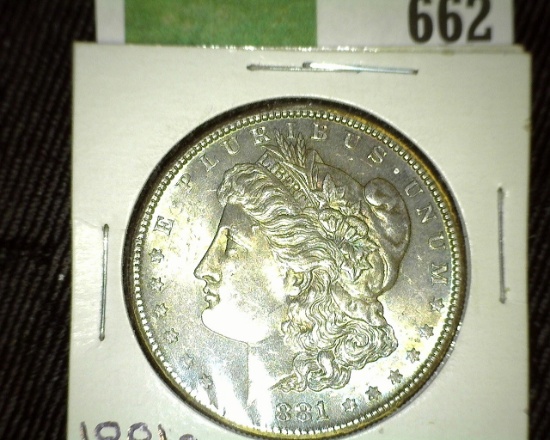 1881 S Morgan Silver Dollar. Brilliant Uncirculated with heavy natural toning.