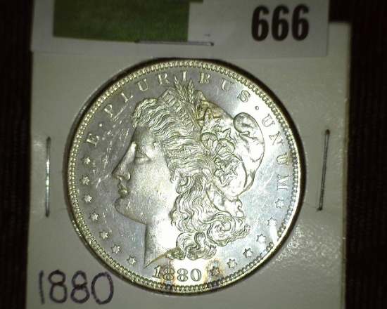 1880 P Morgan Silver Dollar. Brilliant Uncirculated with light natural toning.