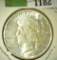 1925 S High Grade U.S. Peace Silver Dollar.