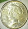 1926 P High Grade U.S. Peace Silver Dollar.