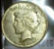 1927 D Key Date U.S. Peace Silver Dollar.