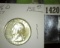 1946 D Silver Washington Quarter in a near Perfect BU grade.