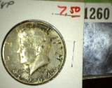 1964 P Silver Kennedy Half Dollar with lovely original toning.