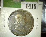1961 P Moderately toned Proof Franklin Silver Half Dollar.