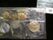 1962 U.S. Five-piece Proof Set in original cellophane. Coins are loose in cellophane with lots of to