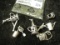 6 sterling charms, 3 watering cans, 3 sand pails and shovels, marked sterling or 925, 14.6g