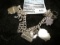 Sterling silver charm bracelet w/13 charms including folded ladder, lobster pot, Jonah in the whale