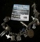 Vintage sterling charm bracelet w/17 charms including alarm clock, telephone, elephant, turtle and m
