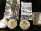 Grab bag of loose gemstones, includes emeralds, opals, other mixed colored stones and ring insets
