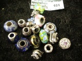 Group of 17 sterling Pandora and Pandora style charms with glass or stones, 41.5g