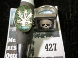 Pair of inlaid sterling rings, 1 w/skull, 1 w/leaf 13.3g