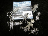 9 sterling figural charms, 21.2g