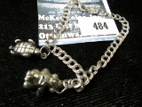 Vintage sterling charm bracelet w/turtle and teddy bear, back of teddy bear opens 9.7g