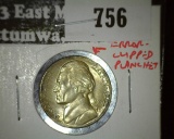 1944-P Jefferson Nickel, BU toned with error, clipped planchet @ 1 oclock, value $15