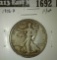 1936-D Walking Liberty Half, F/VF, value $12