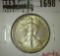 1940 Walking Liberty Half, AU58, AU50 value $22, MS60 value $35