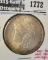 1887 Morgan Dollar, BU toned, MS63 value $65, MS64 value $80, MS65 value $165