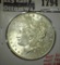 1900 Morgan Dollar, BU, MS63 value $65, MS64 value $80, MS65 value $170