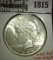1926 Peace Dollar, BU, MS63 value $110, MS64 value $140