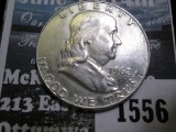 1962 D High Grade Benjamin Franklin Silver Half Dollar.