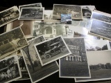 A group of old black and white photos from Swarthmore College, many depict old touring cars.