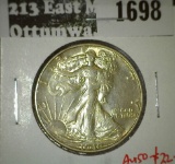 1940 Walking Liberty Half, AU58, AU50 value $22, MS60 value $35