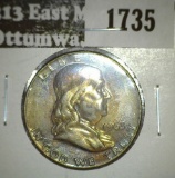1963-D Franklin Half, AU toned, value $12