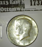 1964-D Kennedy Half, 90% silver, BU, value $15
