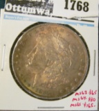 1885 Morgan Dollar, BU toned, MS63 value $65, MS64 value $80, MS65 value $165