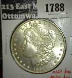 1897 Morgan Dollar, BU, MS64 value $100, MS65 value $330