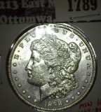 1898 Morgan Dollar, BU, MS63 value $65, MS64 value $90, MS65 value $240