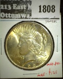 1923 Peace Dollar, BU toned, MS63 value $40, MS65 value $125